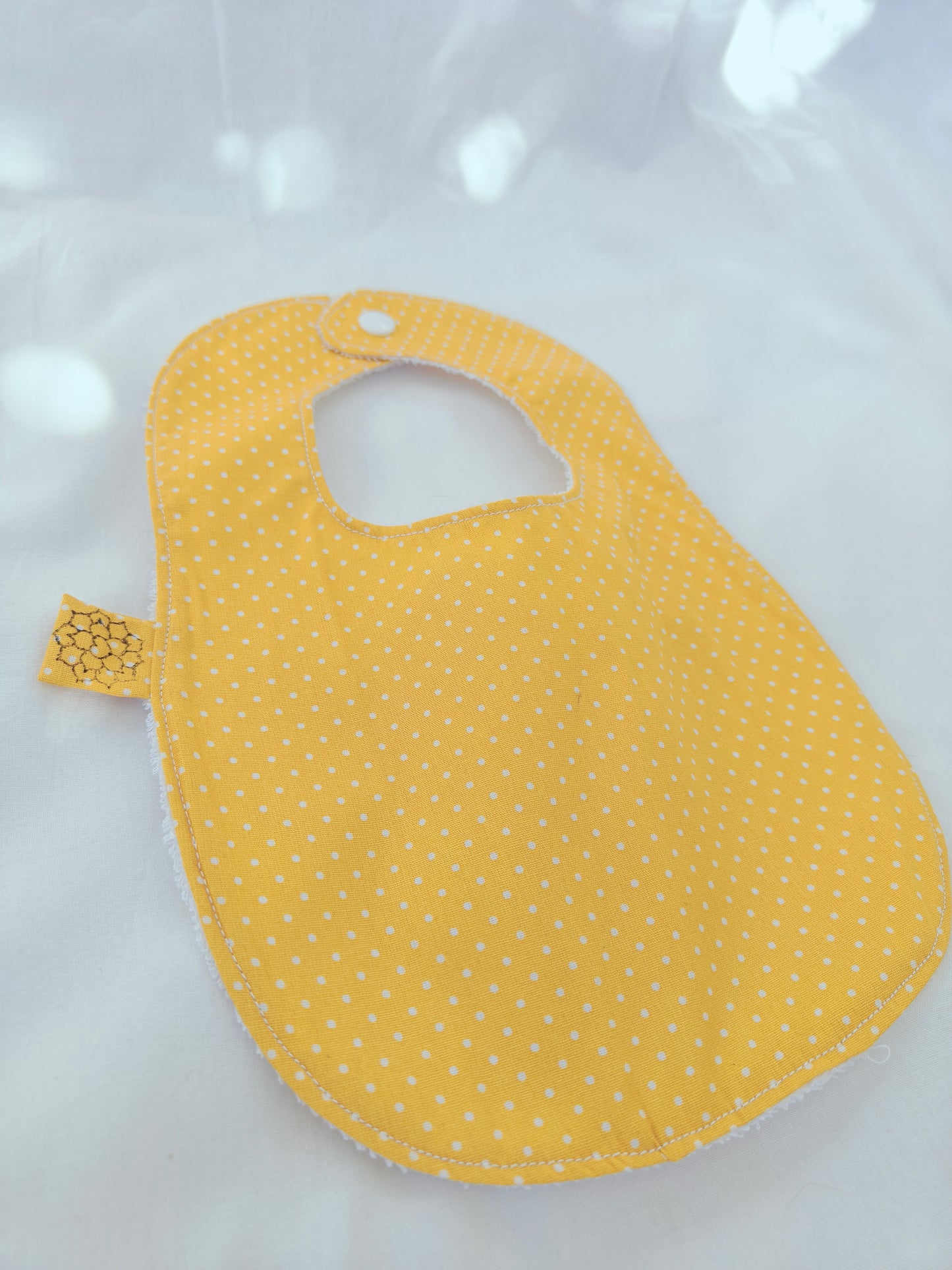 Babete Amarelo Pintas